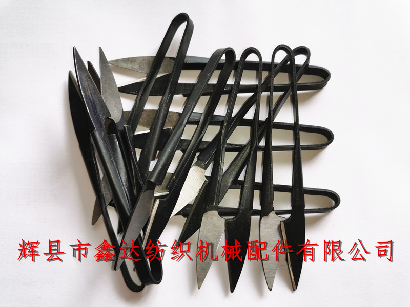 Textile yarn cutting tools